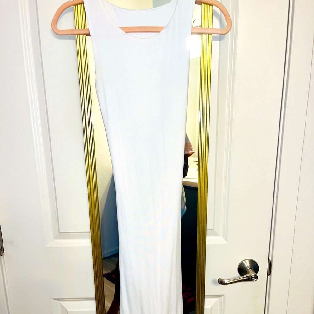White dress with half of the back exposed